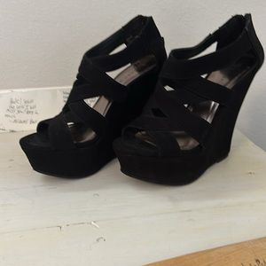 Madden Girl black suede platform shoes.